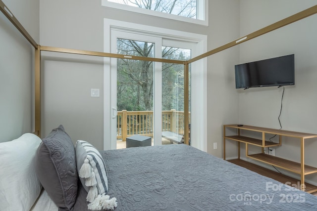 8061 State Highway 80 S, Burnsville, NC 28714 - bedroom with access to outside and wood finished floors
