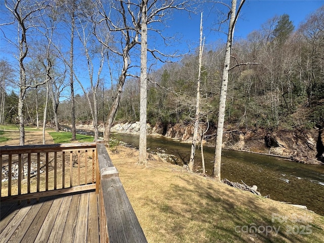 8061 State Highway 80 S, Burnsville, NC 28714 - view of yard with a forest view and a deck