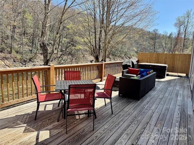 8061 State Highway 80 S, Burnsville, NC 28714 - wooden terrace with a view of trees and outdoor dining area
