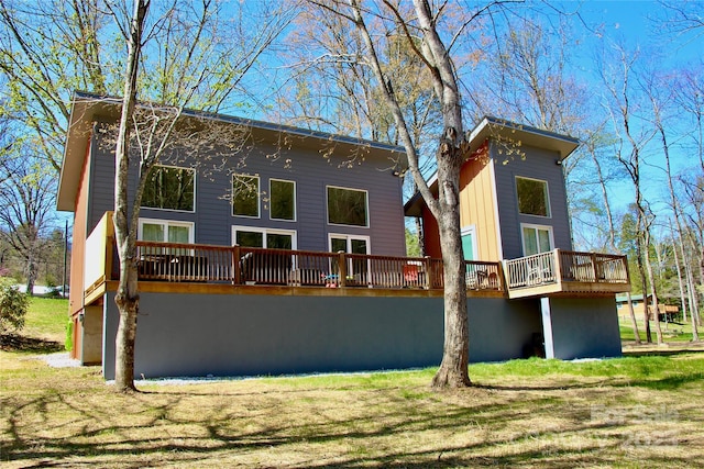 8061 State Highway 80 S, Burnsville, NC 28714 - back of property featuring a deck and a lawn