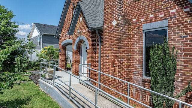 115 12th St SW, Hickory, NC 28602 - view of property exterior with brick siding and a shingled roof