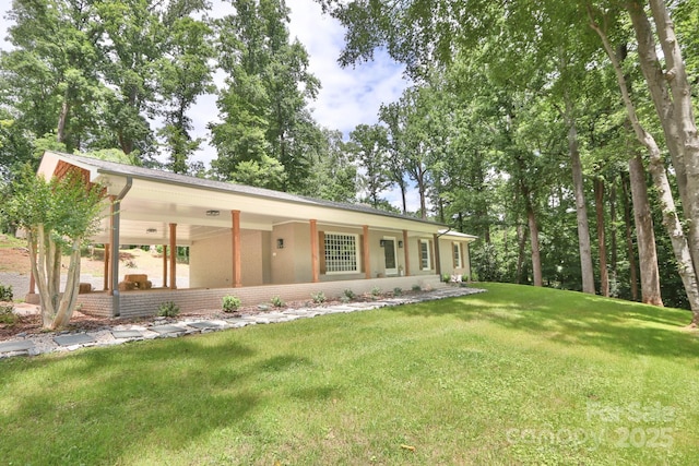 125 Dutchman Creek Rd, Elkin, NC 28621 - view of front of house featuring a front lawn