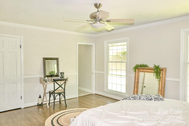 125 Dutchman Creek Rd, Elkin, NC 28621 - bedroom with wood finished floors, crown molding, baseboards, and ceiling fan