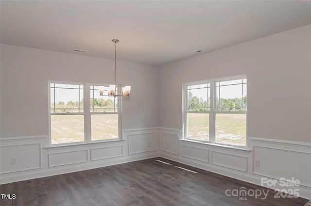 184 Swann Rd Unit 1, Statesville, NC 28625 - unfurnished dining area with a decorative wall, visible vents, a wainscoted wall, and a chandelier