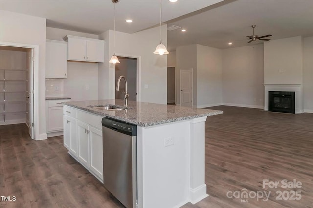 184 Swann Rd Unit 1, Statesville, NC 28625 - kitchen featuring stainless steel dishwasher, light stone countertops, white cabinetry, dark wood-style flooring, and a sink