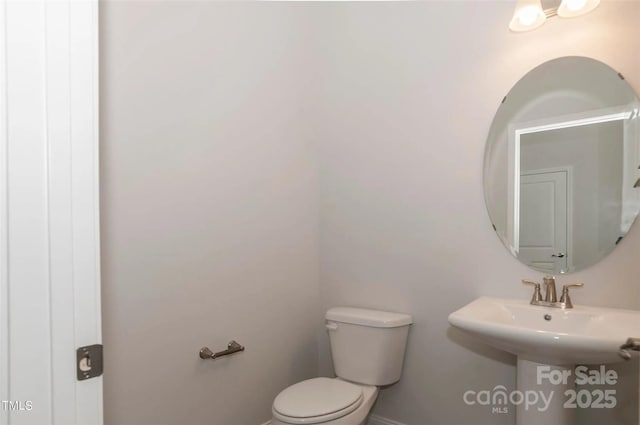 184 Swann Rd Unit 1, Statesville, NC 28625 - half bathroom with toilet and baseboards