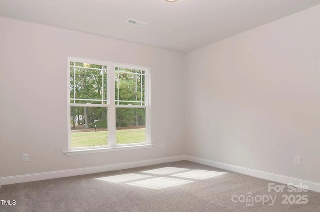 184 Swann Rd Unit 1, Statesville, NC 28625 - empty room featuring visible vents, baseboards, carpet, and a wealth of natural light