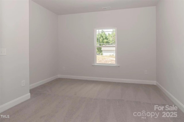 184 Swann Rd Unit 1, Statesville, NC 28625 - unfurnished room with light carpet, visible vents, and baseboards