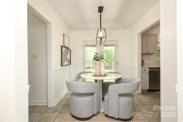 2413 Bergen Ct, Charlotte, NC 28210 - dining room with baseboards and light tile patterned floors