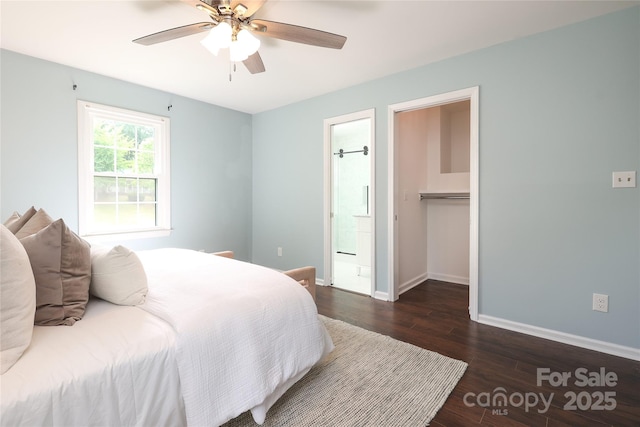 2413 Bergen Ct, Charlotte, NC 28210 - bedroom featuring a spacious closet, dark wood-style floors, connected bathroom, baseboards, and ceiling fan