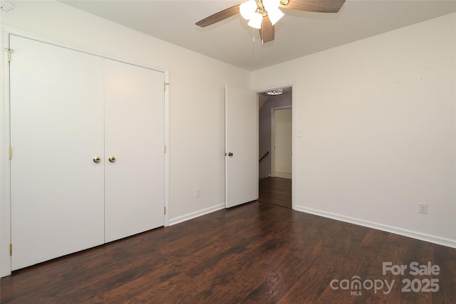 2413 Bergen Ct, Charlotte, NC 28210 - unfurnished bedroom with baseboards, a ceiling fan, dark wood-style floors, and a closet
