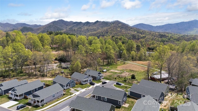 birds eye view of property with a residential view, a forest view, and a mountain view