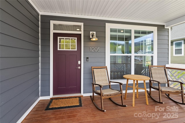 entrance to property with a porch
