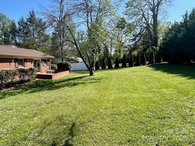 1026 Garden St SE, Lenoir, NC 28645 - view of yard featuring fence