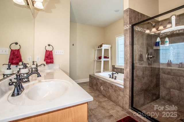 full bathroom with a garden tub, double vanity, a sink, and a shower stall