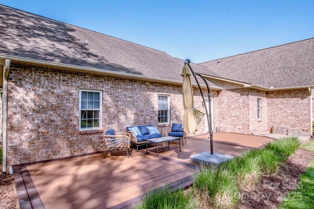 deck featuring outdoor lounge area