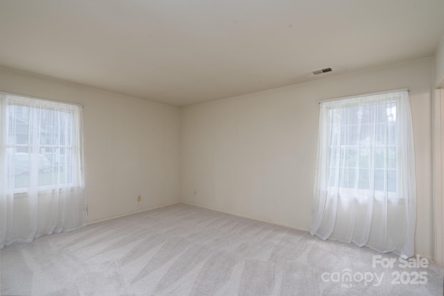 6815 Old Post Rd, Charlotte, NC 28212 - empty room with visible vents and light colored carpet