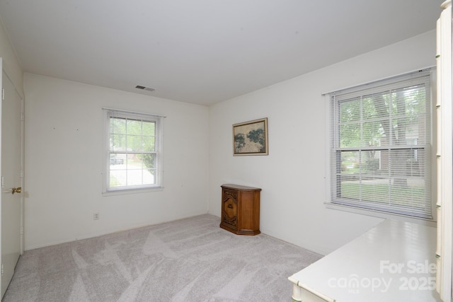 6815 Old Post Rd, Charlotte, NC 28212 - empty room featuring carpet floors and visible vents