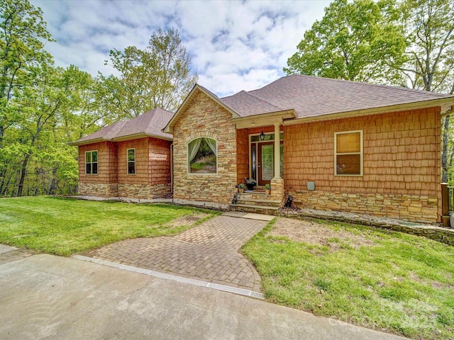 135 Boulder Ridge Dr, Denton, NC 27239 - single story home featuring a front lawn, a shingled roof, and stone siding