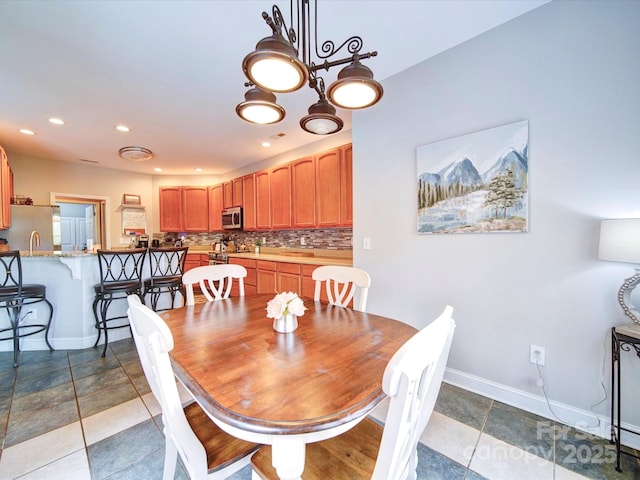 135 Boulder Ridge Dr, Denton, NC 27239 - tiled dining area featuring recessed lighting and baseboards