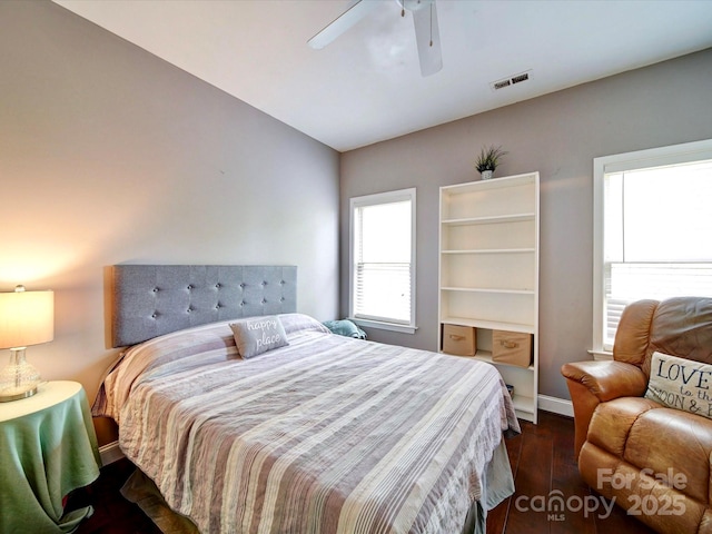 135 Boulder Ridge Dr, Denton, NC 27239 - bedroom with visible vents, ceiling fan, baseboards, and dark wood-style floors