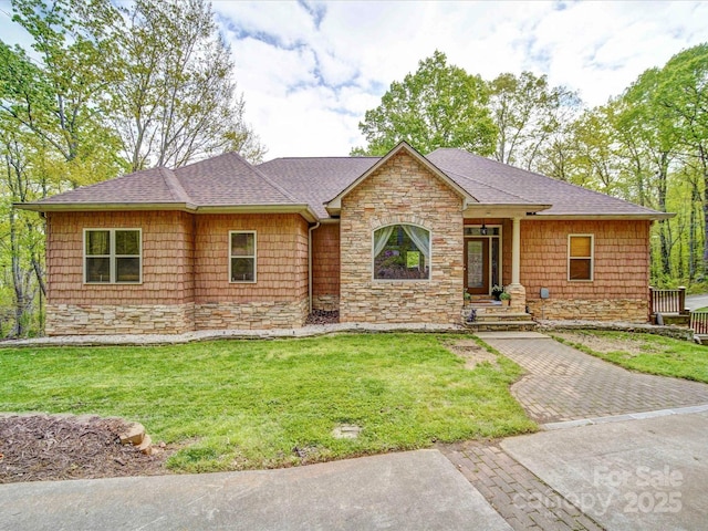 135 Boulder Ridge Dr, Denton, NC 27239 - ranch-style house with roof with shingles, a front yard, and stone siding