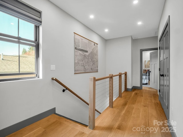 408 S Oconeechee Ave, Black Mountain, NC 28711 - hallway featuring light wood-style floors, recessed lighting, baseboards, and an upstairs landing