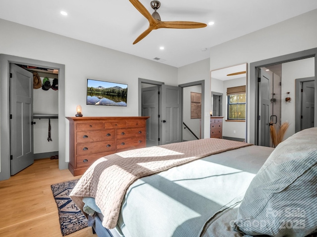 408 S Oconeechee Ave, Black Mountain, NC 28711 - bedroom with visible vents, light wood-style floors, recessed lighting, a spacious closet, and a closet