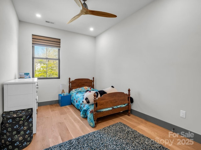 408 S Oconeechee Ave, Black Mountain, NC 28711 - bedroom featuring baseboards, ceiling fan, visible vents, and wood finished floors