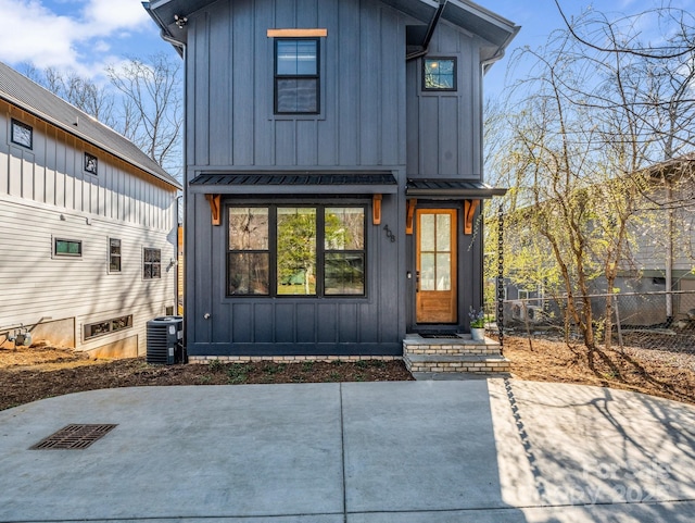 408 S Oconeechee Ave, Black Mountain, NC 28711 - back of property featuring a patio, board and batten siding, fence, and cooling unit