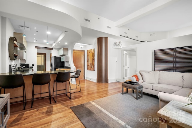 84 Walnut St Unit 203, Asheville, NC 28801 - living area featuring beamed ceiling, light wood-style flooring, visible vents, and recessed lighting