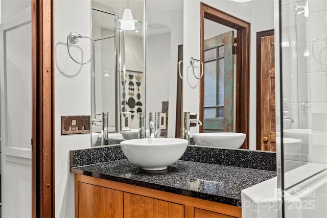 84 Walnut St Unit 203, Asheville, NC 28801 - bathroom with vanity and a stall shower