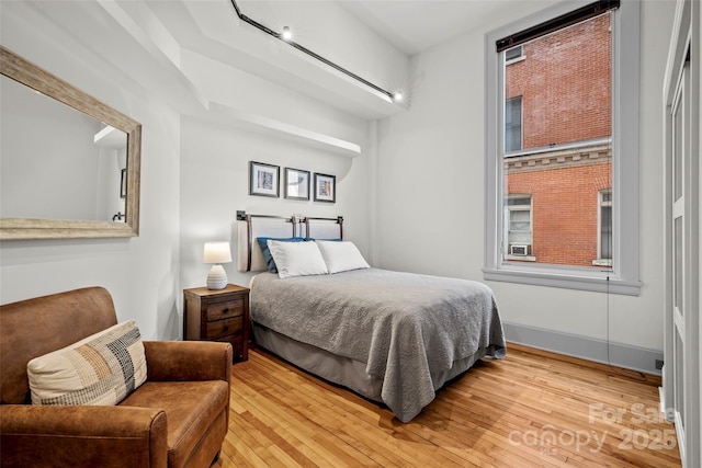 84 Walnut St Unit 203, Asheville, NC 28801 - bedroom featuring hardwood / wood-style flooring