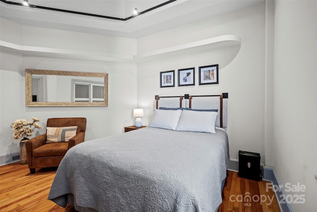 84 Walnut St Unit 203, Asheville, NC 28801 - bedroom featuring wood finished floors