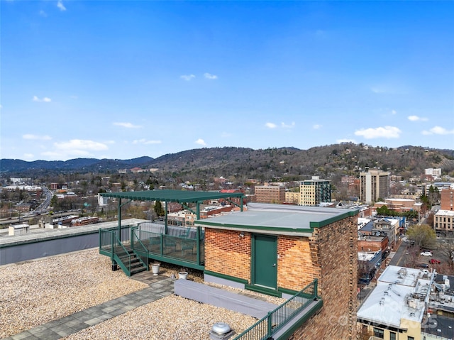84 Walnut St Unit 203, Asheville, NC 28801 - exterior space featuring brick siding and a deck with mountain view