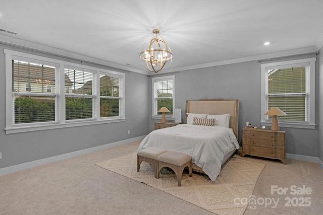 carpeted bedroom with visible vents, baseboards, a chandelier, crown molding, and recessed lighting