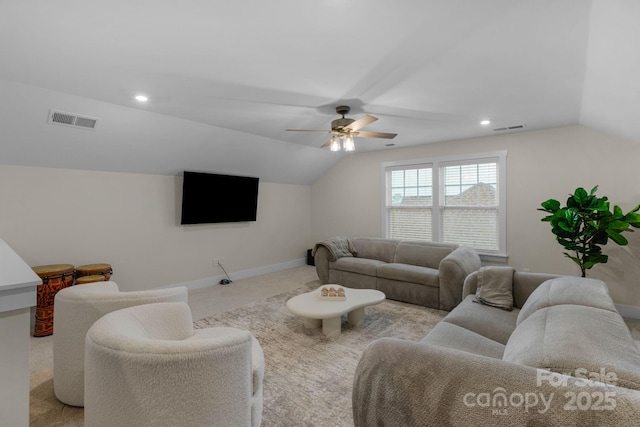 carpeted living room featuring baseboards, vaulted ceiling, and visible vents