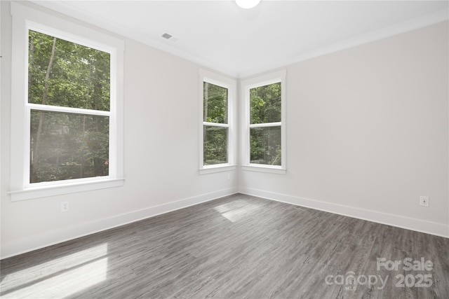 8937 Penstemons Dr, Charlotte, NC 28215 - empty room featuring wood finished floors and baseboards