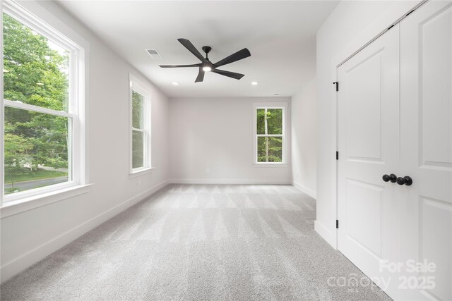 8937 Penstemons Dr, Charlotte, NC 28215 - unfurnished bedroom with recessed lighting, carpet floors, and ceiling fan