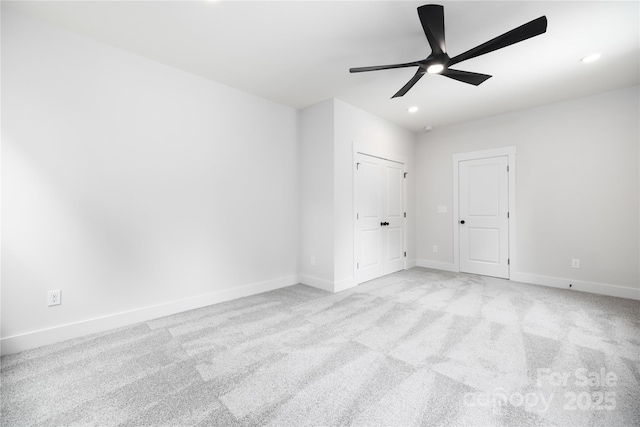8937 Penstemons Dr, Charlotte, NC 28215 - unfurnished bedroom with light carpet, recessed lighting, and a ceiling fan