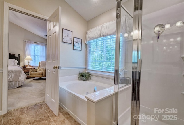394 Runnymede Dr, Rock Hill, SC 29732 - ensuite bathroom with a bath, ensuite bath, a shower with door, vaulted ceiling, and tile patterned floors