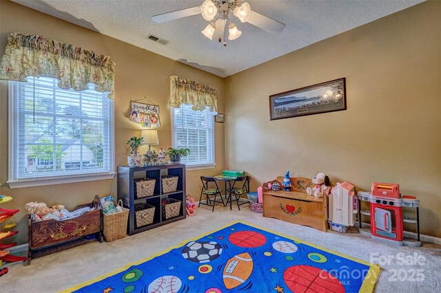 394 Runnymede Dr, Rock Hill, SC 29732 - playroom featuring carpet flooring, visible vents, a textured ceiling, and ceiling fan