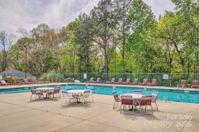 394 Runnymede Dr, Rock Hill, SC 29732 - community pool featuring a patio and fence