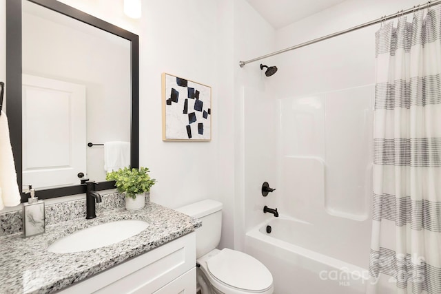 full bath with toilet, vanity, and shower / bath combination with curtain
