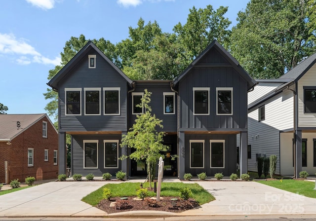 2008 St John St, Charlotte, NC 28216 - view of front of property with board and batten siding