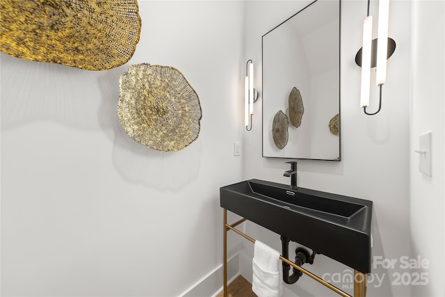2008 St John St, Charlotte, NC 28216 - bathroom with wood finished floors and baseboards