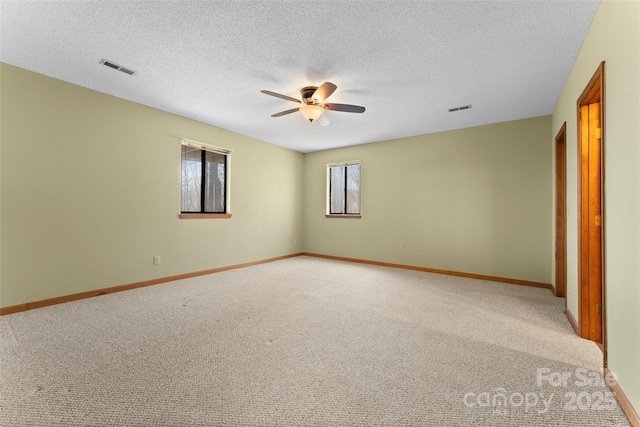 1 Sleepy Hollow Dr, Maggie Valley, NC 28751 - unfurnished bedroom with visible vents, baseboards, and light carpet