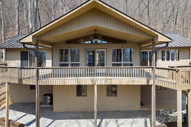 1 Sleepy Hollow Dr, Maggie Valley, NC 28751 - rear view of house with central AC unit, metal roof, and a standing seam roof