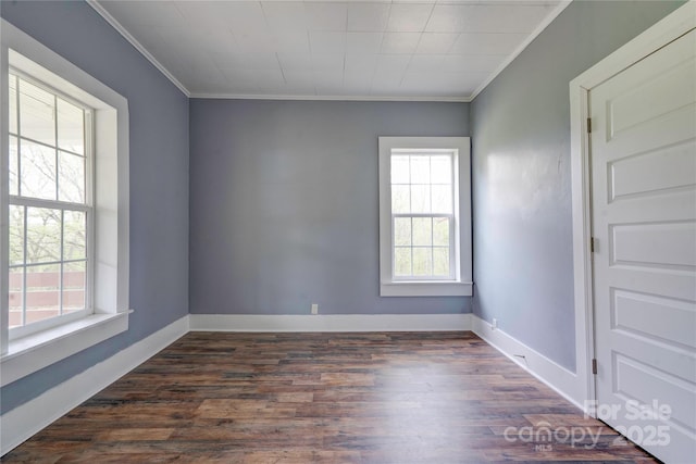 210 Moriah School Rd, Casar, NC 28020 - unfurnished room with crown molding, plenty of natural light, dark wood-style flooring, and baseboards
