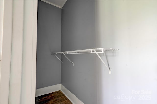 210 Moriah School Rd, Casar, NC 28020 - spacious closet featuring dark wood-style flooring
